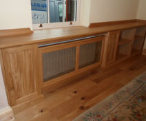 Bespoke Polished Oak Living Room Cabinets with Radiator Covers