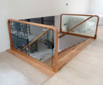 Modern Bespoke Polished Oak Staircase with Glass Banisters