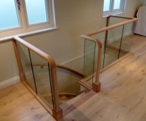 Tulipwood Staircase and Oiled Oak Glass Banister with Wall Handrail