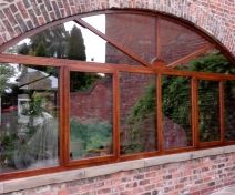 Top Arch Stained Casement Window