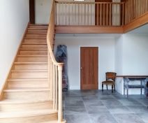Bespoke Part Curved Polished Oak Staircase with Bullnose step, Landing Banisters and Apron Covers