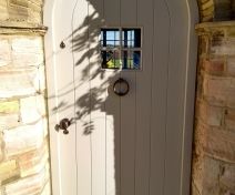 Bespoke Arched Top External Door with V Groove Boards