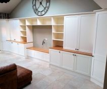 Bespoke Fitted Living Room Cabinet with a Bench and Polished Oak Tops