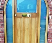 1930s Style Double Glazed Arched Top External Door and Frame made out of Accoya Timber and Stained