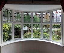 Stained and Leaded Double Glazing Units Flush Casement Bow Window Made out of Accoya and Painted White