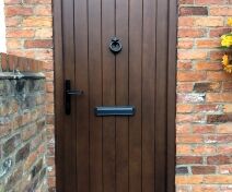 Stained Accoya External Door and Frame with 3 Point Lock and Black Furniture